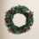 Artificial 24" LED Mixed Pine Christmas Wreath with Flocking, Pinecones and Berries, Green