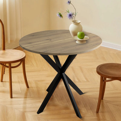 Table de salle à manger minimaliste avec pieds en métal et plateau en bois