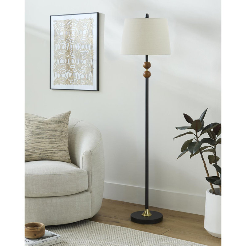 Lampe sur pied traditionnelle en bois massif avec interrupteur au pied Ezella