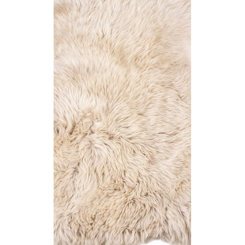 Tapis beige en peau de mouton Ameena