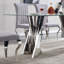 Modern Elegance: table de salle à manger en verre trempé | Miroir argenté avec base en acier inoxydable | Conception élégante et durable