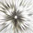Metal Coiled Ribbon Sunburst Silver Wall Decor with Black Frame