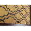 Tapis géométrique doré en laine touffeté à la main