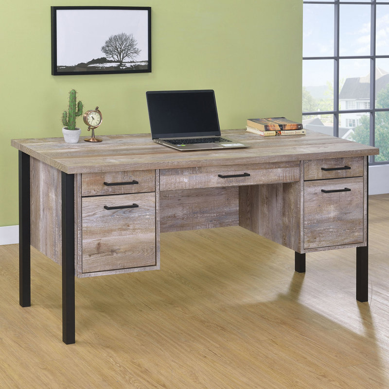 Bureau en chêne patiné à 4 tiroirs