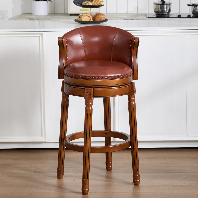Tabouret de bar pivotant avec siège en cuir fleur, dossier souple, structure et repose-pieds en bois d'hévéa pour la cuisine, la salle à manger ou le bar