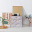 Boîtes de rangement décoratives en carton bleu et blanc avec quincaillerie dorée - ensemble de 3, Volière - Boîtes empilables avec couvercles pour la décoration et l'organisation, design élégant