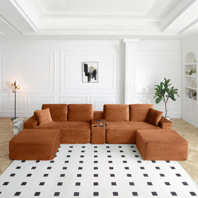 Canapé modulaire en forme de L de 125 pouces avec deux repose-pieds, sièges profonds, porte-gobelets et ports de chargement USB pour les salons modernes.