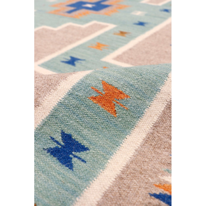 Isabelline Reversible Wool Mocha Area Rug- 6' X 9'