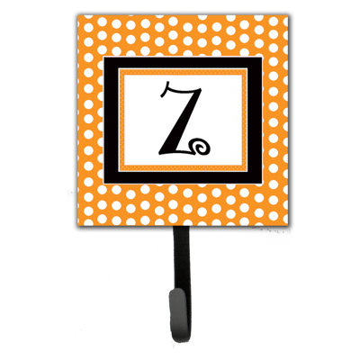 Porte-laisse coussin monogramme et crochet mural