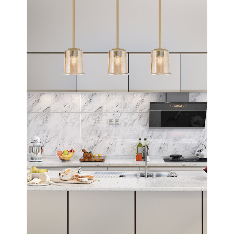 Anneken Stem Hung Mini Pendant Shown In New Age Brass Finish With 5.25" Amber Bubble Glass, Amber/Brass
