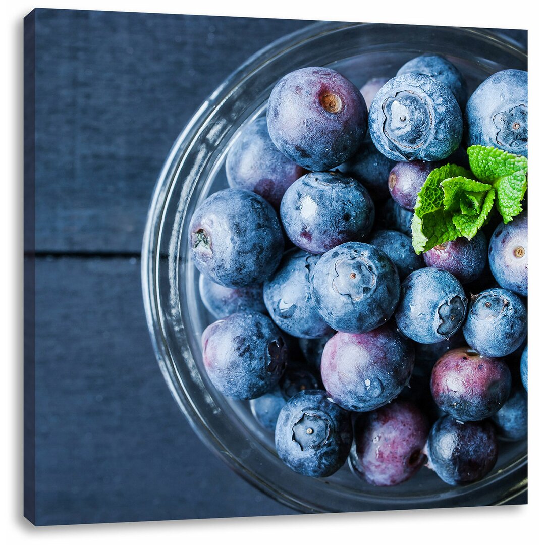 Leinwandbild Glas mit frischen Blaubeeren