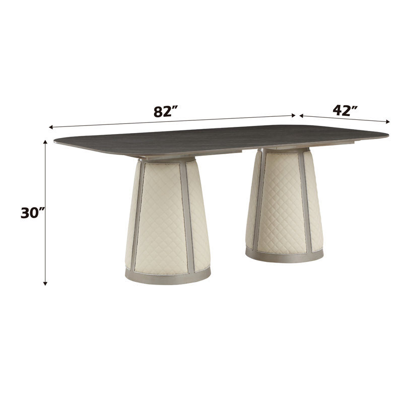 Table de salle à manger à finition champagne avec plateau en pierre frittée et base en bois composite
