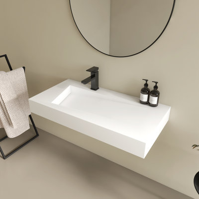 Lavabo de salle de bain mural 35 "en forme de V en résine flottante durable en pierre avec trou de robinet