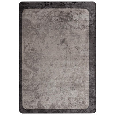 Tapis moderne à bordure asymétrique