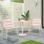 Ensemble de mobilier de patio, une table avec deux chaises-1033506701