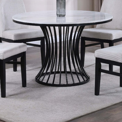 Table de salle à manger ronde unique avec plateau en faux marbre et base en forme de cage