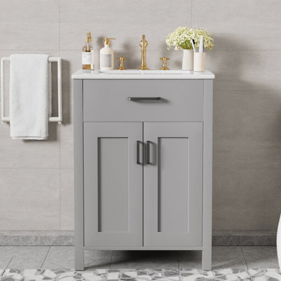 Meuble-lavabo 24 po avec lavabo en céramique, finition noire et portes à fermeture en douceur