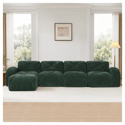Canapé modulaire en L capitonné vert avec repose-pieds mobile, canapé-lit Cloud Comfort