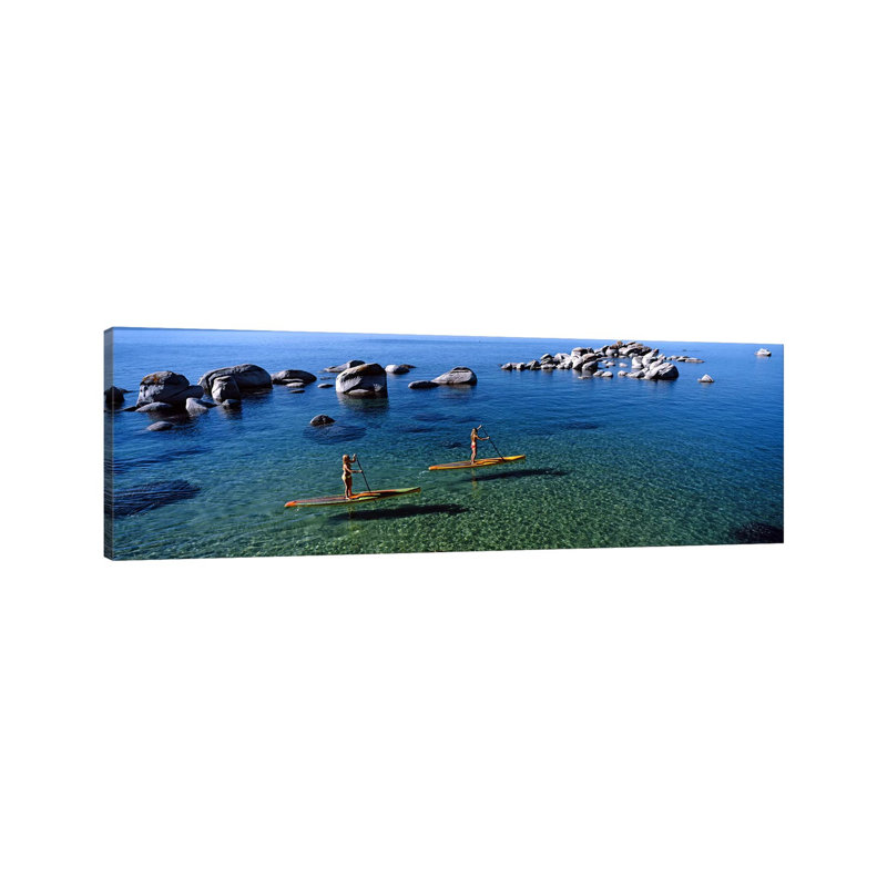 Two Women Paddle Boarding In A Lake, Lake Tahoe, California, USA - Wrapped Canvas Panoramic Print