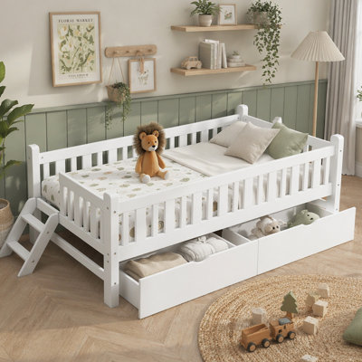 Lit plateforme pratique en bois avec garde-corps et deux tiroirs, offrant un espace sûr et du rangement pour les chambres d'enfants