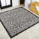 Deronte Vintage Filigree Textured Weave Light Gray/Black Indoor/Outdoor Rug