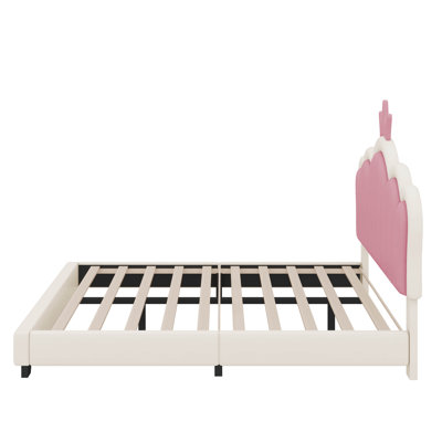 Lit double tapissier avec tête de lit couronne