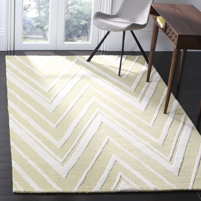 Tapis doré / ivoire en laine touffeté à la main Sanyla
