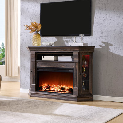 Meuble télé d'angle de style ferme de 142,5 cm (56,1 po) pour téléviseurs jusqu'à 165 cm (65 po), avec foyer électrique, panneau amovible et rangement.