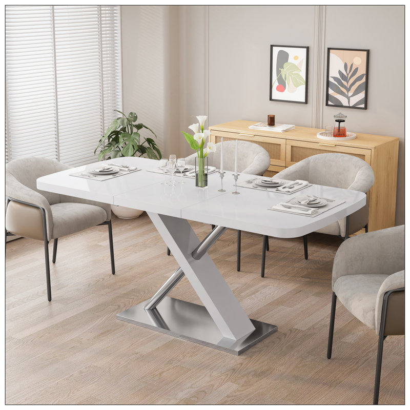 Table de salle à manger moderne avec conception extensible et base en métal robuste pour les réunions de famille