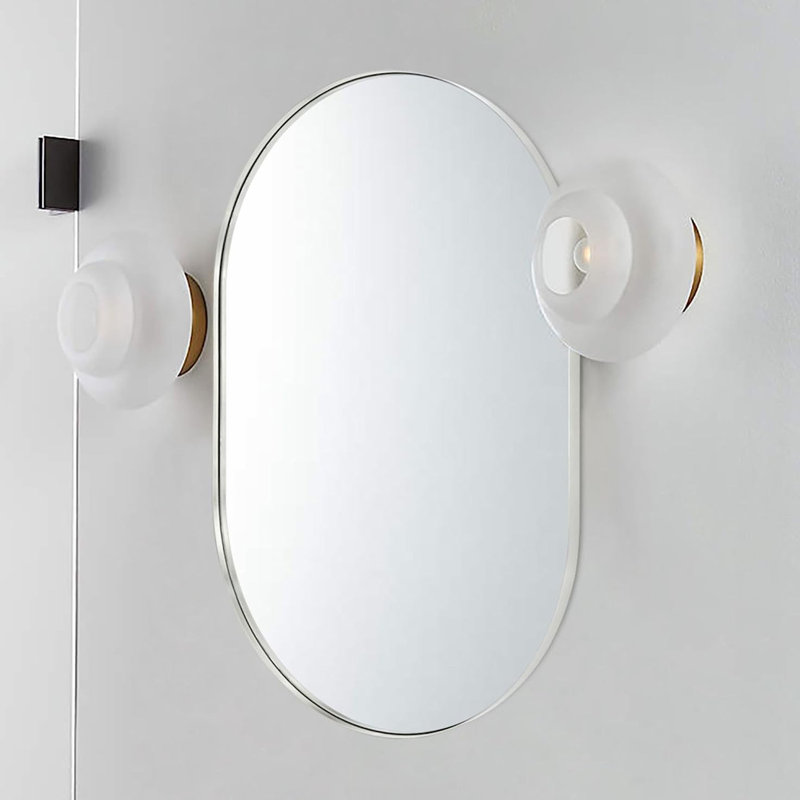 Miroir ovale en métal