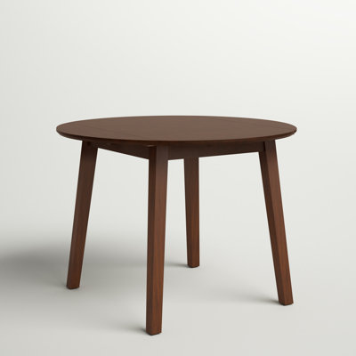 Chaffin Extendable Round Solid Wood Dining Table