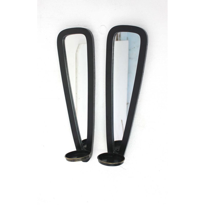 Ensemble de deux bougeoirs muraux en bois massif noir