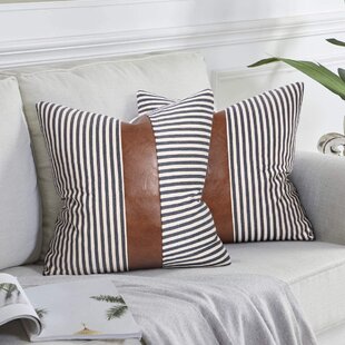 https://assets.wfcdn.com/im/28082444/resize-h310-w310%5Ecompr-r85/1781/178153976/kulvinder-striped-faux-leather-pillow-cover-set-of-2.jpg