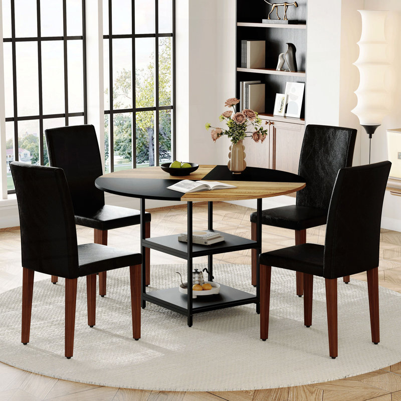 Ensemble de table et de chaises.Une table de salle à manger circulaire de couleur moderne épissée de 47,3 pouces de diamètre - rangement double couche. Combinée avec 4 chaises de salle à manger en tissu, simples et polyvalentes, confortables.