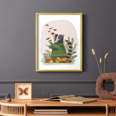 «Raccoon Catching Leaves», reproduction encadrée - bois massif