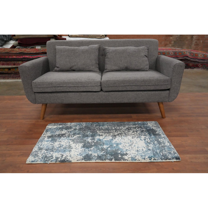 Tapis moderne bleu abstrait 2 x 4 pour un salon contemporain