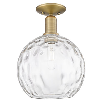 Arcadia - Champlon - 1 Light 10" Semi-Flush Mount - Brushed Brass Finish - Clear Water Glass Shade