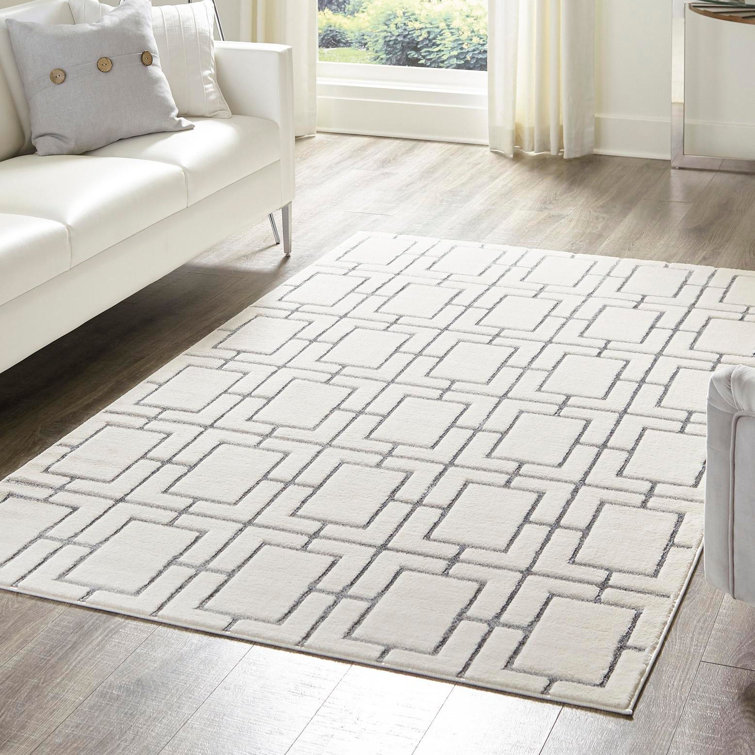 Tapis de style glam à motif géométrique blanc et argenté Glam