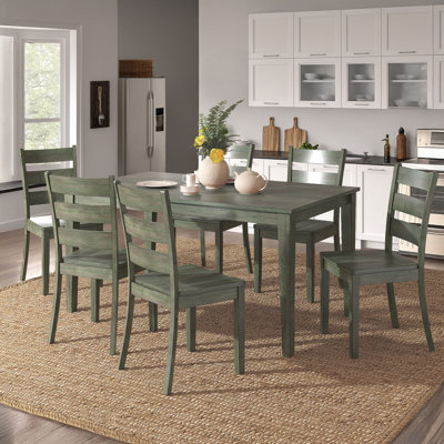 Norita 6 - Person Solid Wood Top Four Leg Dining Set