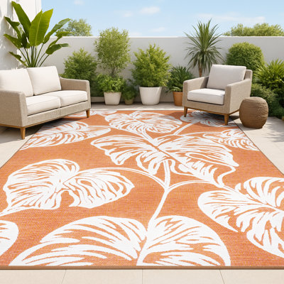 Tapis intérieur / extérieur à deux tons orange / ivoire Delmoe Tobago