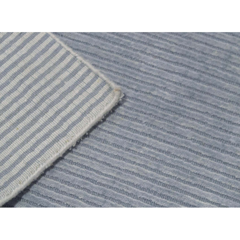 Tapis bleu clair noué à la main de haute qualité
