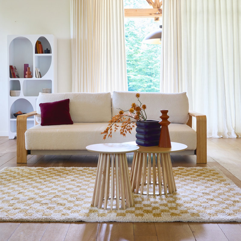 3-seater sofa bed in white boucle fabric with wooden armrests