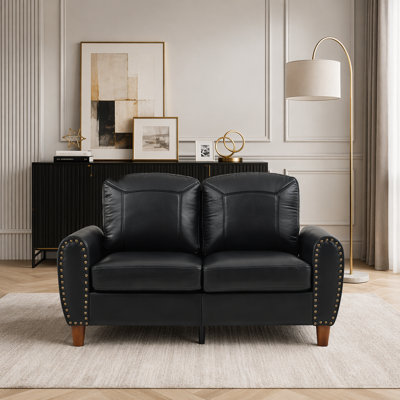 Causeuse classique en similicuir respirant avec rivets en laiton