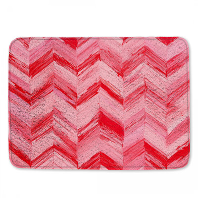 Tapis de bain à chevrons rouge et rose