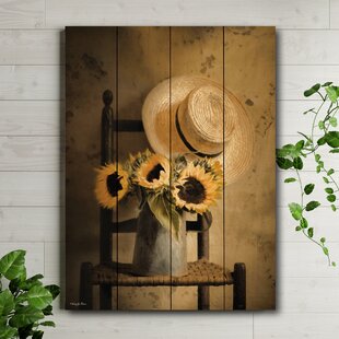 https://assets.wfcdn.com/im/28127127/resize-h310-w310%5Ecompr-r85/1101/110114686/sunny-inside-on-wood-print.jpg