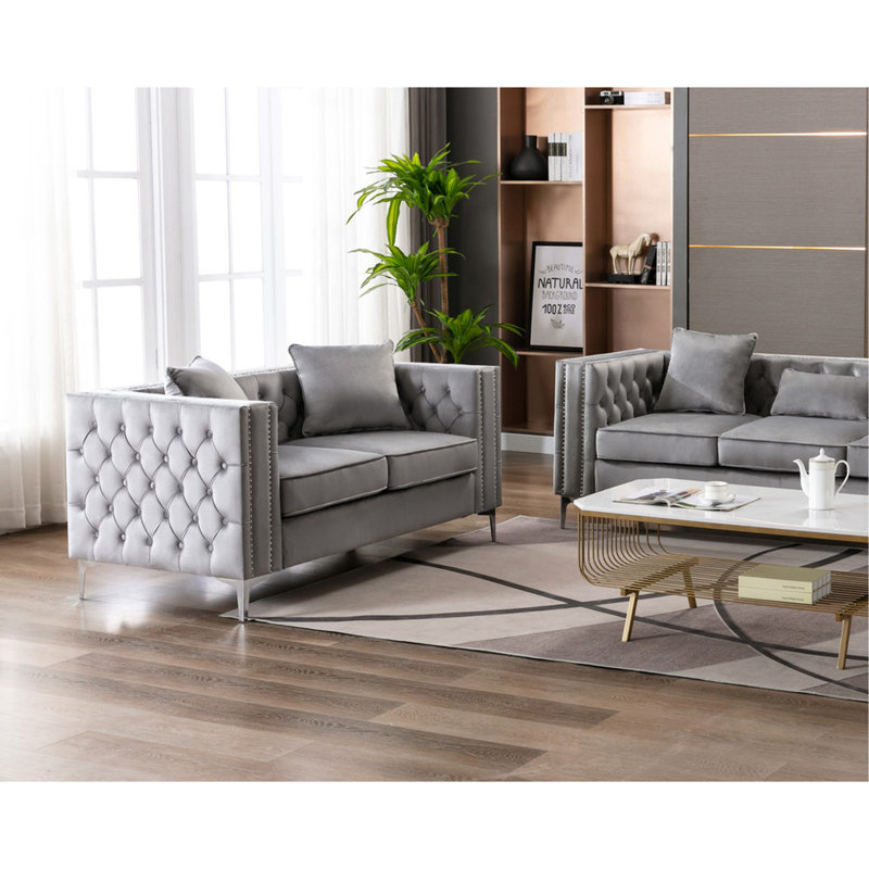 Comfortable Velvet Loveseat With Nailhead Trim And Button Tufting, Ideal For Relaxing And Entertaining.