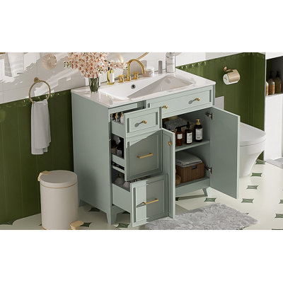 Meuble-lavabo moderne avec lavabo en céramique, plusieurs tiroirs, tablettes réglables, portes à fermeture en douceur pour un rangement efficace dans les petites et moyennes salles de bain