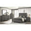 Lit simple gris moderne, offrant une chambre luxueuse avec structure en bois
