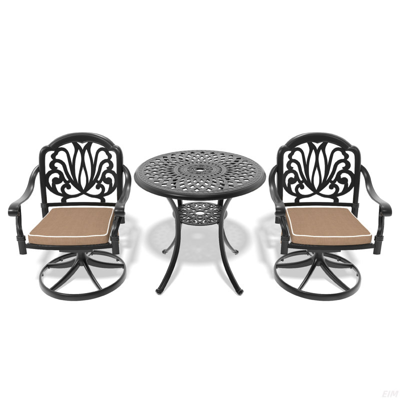 L'ensemble de salle à manger en fonte d'aluminium toutes saisons comprend des chaises pivotantes et une table avec un cadre noir