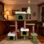 Arbre à chat, tour de chat d'intérieur à thème de Noël, terrain de jeu d'escalade à plusieurs niveaux avec poteaux à griffer en sisal et cachettes douillettes, centre d'activités festives pour chatons et chats adultes